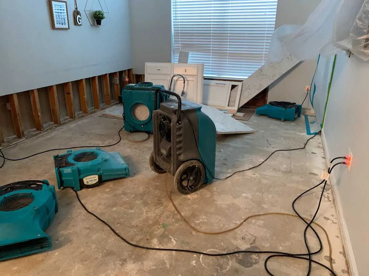 Dehumidifier in flood-cut room for Water Damage Restoration in East Nottingham